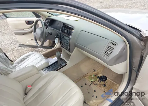 1999 Toyota Avalon Xls from USA, damaged, VIN 4T1BF18B2XU322737